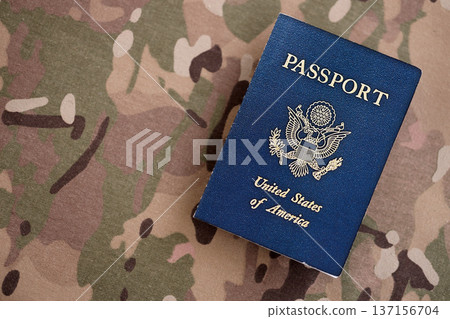 US passport on table close up. Official identification document book for citizens of United States. Concept of travel and tourism 137156704