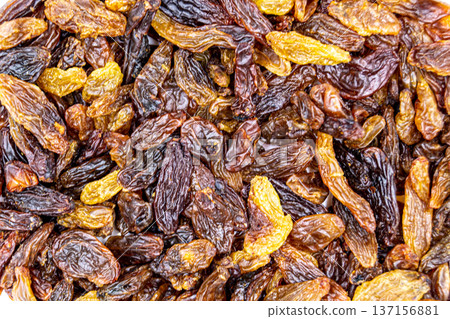 beautiful texture ripe of natural raisins on background beautiful texture ripe of natural raisins on background 137156881
