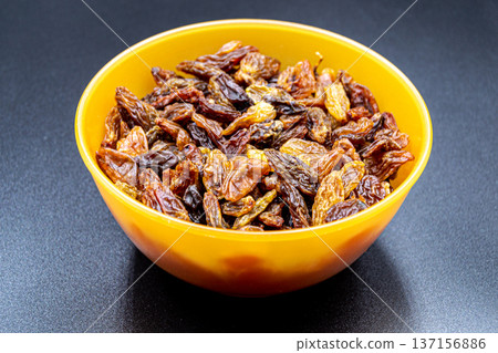 beautiful texture ripe of natural raisins on background beautiful texture ripe of natural raisins on background 137156886