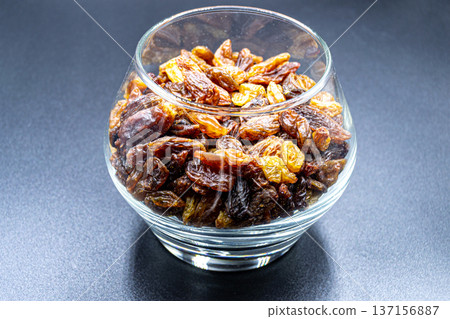 beautiful texture ripe of natural raisins on background beautiful texture ripe of natural raisins on background 137156887