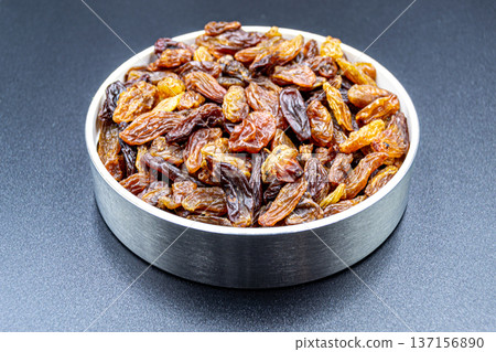 beautiful texture ripe of natural raisins on background beautiful texture ripe of natural raisins on background 137156890