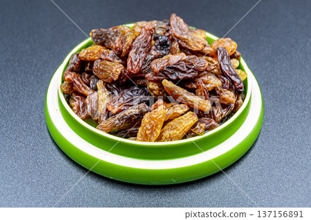 beautiful texture ripe of natural raisins on background beautiful texture ripe of natural raisins on background 137156891