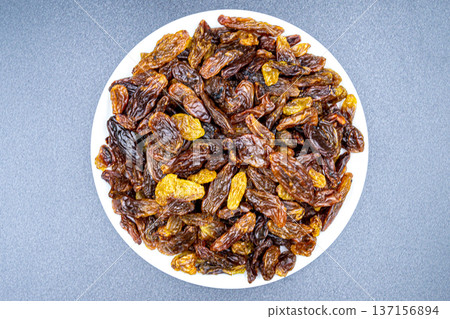 beautiful texture ripe of natural raisins on background beautiful texture ripe of natural raisins on background 137156894