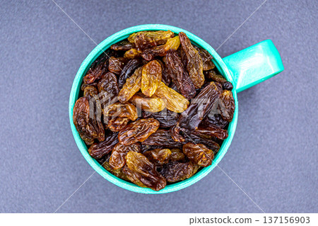 beautiful texture ripe of natural raisins on background beautiful texture ripe of natural raisins on background 137156903