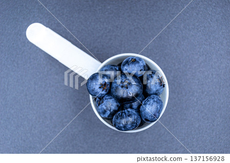 delicious summer blueberries on grocery market counter 137156928