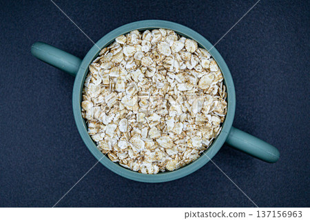beautiful texture ripe of natural flakes oat on background beautiful texture ripe of natural flakes oat on background 137156963