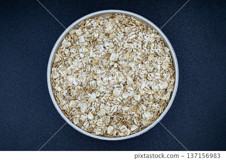 beautiful texture ripe of natural flakes oat on background beautiful texture ripe of natural flakes oat on background 137156983