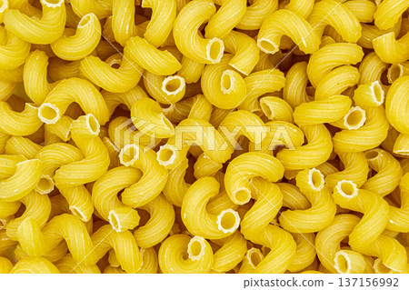 beautiful texture ripe of natural Italian pasta on background beautiful texture ripe of natural Italian pasta on background 137156992