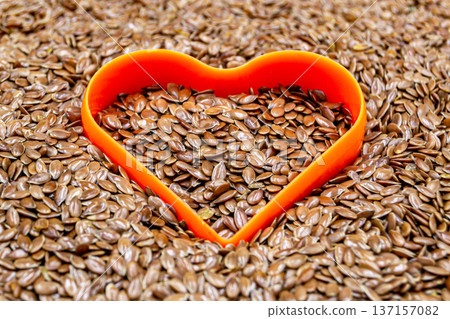 beautiful texture ripe of natural flax seeds on background beautiful texture ripe of natural flax seeds on background 137157082