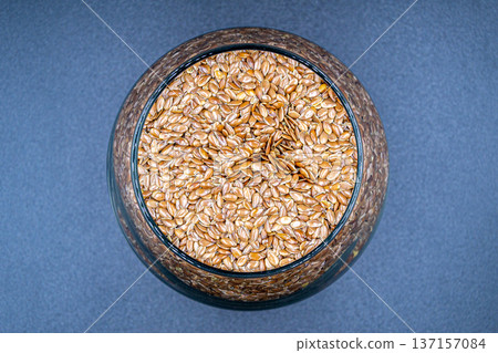 beautiful texture ripe of natural flax seeds on background beautiful texture ripe of natural flax seeds on background 137157084