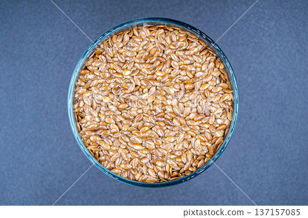 beautiful texture ripe of natural flax seeds on background beautiful texture ripe of natural flax seeds on background 137157085