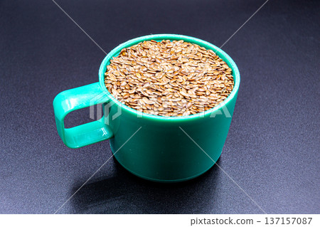beautiful texture ripe of natural flax seeds on background beautiful texture ripe of natural flax seeds on background 137157087