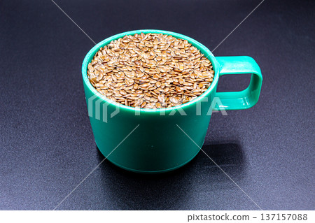beautiful texture ripe of natural flax seeds on background beautiful texture ripe of natural flax seeds on background 137157088