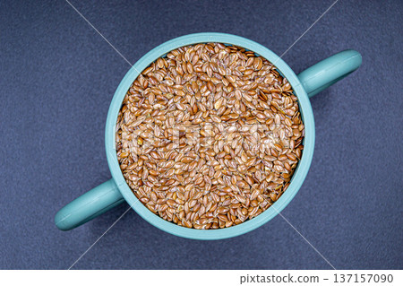 beautiful texture ripe of natural flax seeds on background beautiful texture ripe of natural flax seeds on background 137157090