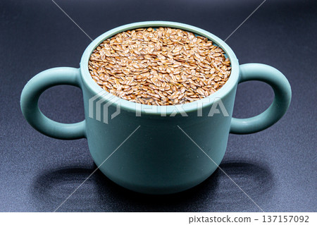 beautiful texture ripe of natural flax seeds on background beautiful texture ripe of natural flax seeds on background 137157092
