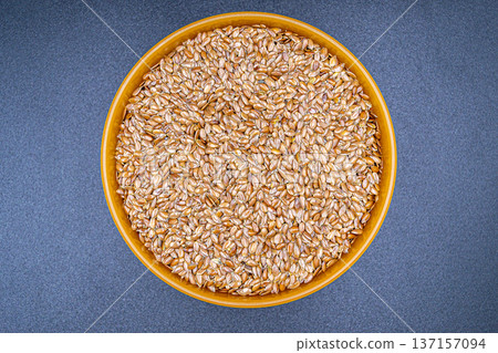 beautiful texture ripe of natural flax seeds on background 137157094