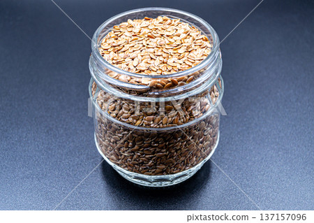 beautiful texture ripe of natural flax seeds on background beautiful texture ripe of natural flax seeds on background 137157096
