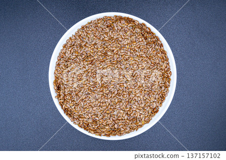 beautiful texture ripe of natural flax seeds on background beautiful texture ripe of natural flax seeds on background 137157102
