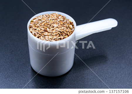 beautiful texture ripe of natural flax seeds on background beautiful texture ripe of natural flax seeds on background 137157106