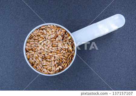 beautiful texture ripe of natural flax seeds on background beautiful texture ripe of natural flax seeds on background 137157107