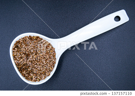 beautiful texture ripe of natural flax seeds on background beautiful texture ripe of natural flax seeds on background 137157110