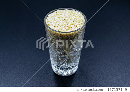 beautiful texture ripe of natural sesame seeds on background beautiful texture ripe of natural sesame seeds on background 137157149