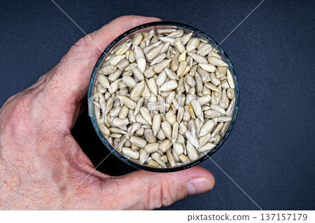 beautiful texture ripe of natural sunflower seeds on background beautiful texture ripe of natural sunflower seeds on background 137157179