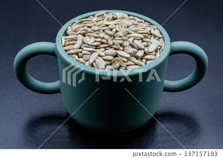 beautiful texture ripe of natural sunflower seeds on background beautiful texture ripe of natural sunflower seeds on background 137157183
