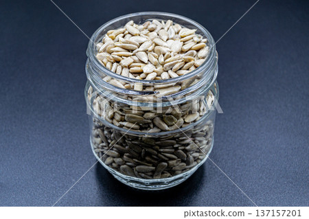 beautiful texture ripe of natural sunflower seeds on background beautiful texture ripe of natural sunflower seeds on background 137157201