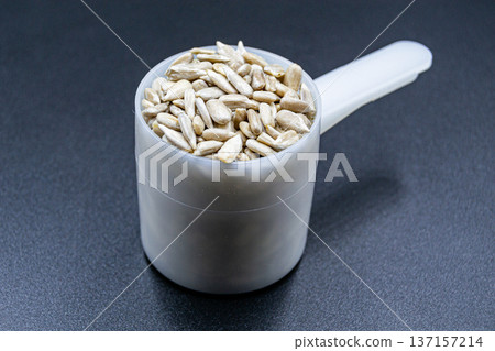 beautiful texture ripe of natural sunflower seeds on background beautiful texture ripe of natural sunflower seeds on background 137157214