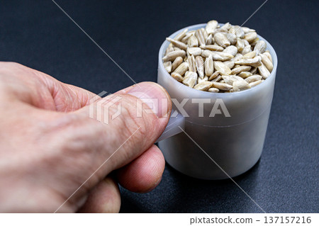 beautiful texture ripe of natural sunflower seeds on background beautiful texture ripe of natural sunflower seeds on background 137157216
