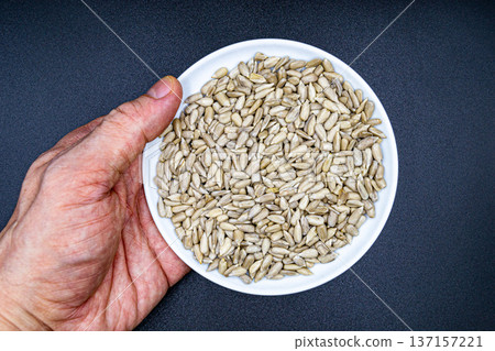 beautiful texture ripe of natural sunflower seeds on background beautiful texture ripe of natural sunflower seeds on background 137157221