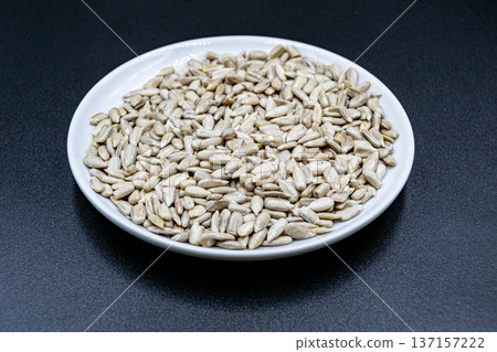 beautiful texture ripe of natural sunflower seeds on background beautiful texture ripe of natural sunflower seeds on background 137157222