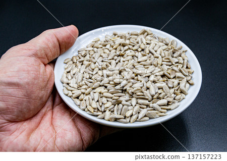 beautiful texture ripe of natural sunflower seeds on background beautiful texture ripe of natural sunflower seeds on background 137157223