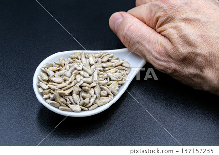 beautiful texture ripe of natural sunflower seeds on background 137157235