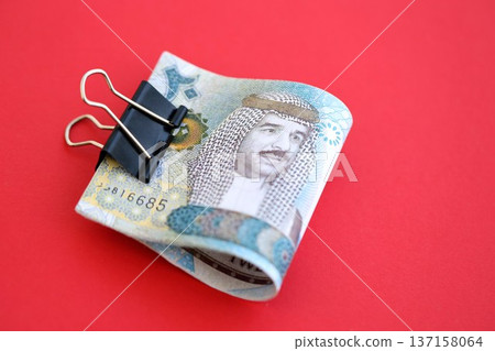 Bahraini dinar money bills in big amount on red close up. Finance and banking concept 137158064