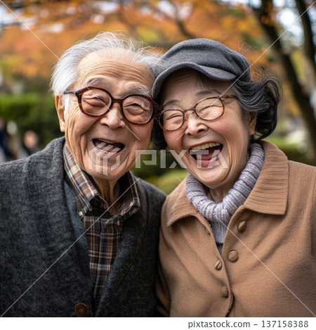 Charming portrait of an elderly Japanese couple. Couple radiates warmth and love with gentle smiles. 137158388