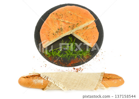Traditional Focaccia on Slate Board and Rustic Bread Loaf 137158544