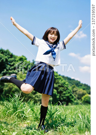 Smiling female junior and senior high school students jumping energetically Smiling female junior and senior high school students jumping energetically 137159597