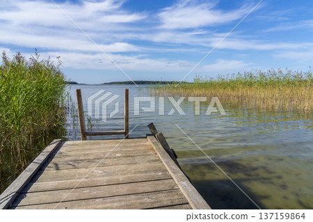Lake Seksty. Landscape of Masuria in Poland, Karwik village in the Pisz area. 137159864