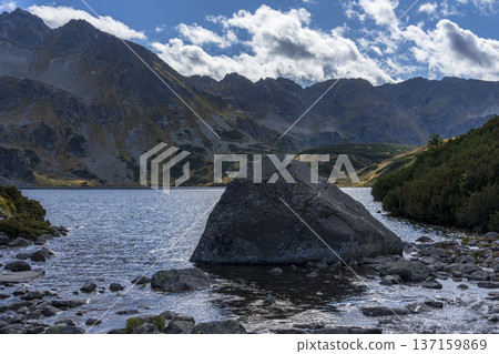 Boulder in the Great Polish Pond. Tatra Mountains. 137159869