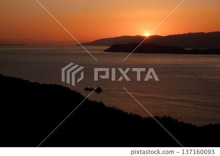 Sunset on the horizon seen from Kishu Kada 137160093