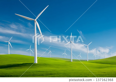 Clean energy concept with wind turbines in a green field under a clear sunny sky 137162368