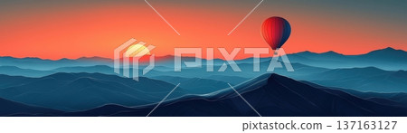 Hot Air Balloon Over Mountain Landscape at Sunrise with Colorful Sky and Warm Horizon 137163127