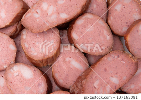 pieces of smoked sausage as background pieces of smoked sausage as background 137165081