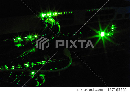 A network server room with the lights off 137165531