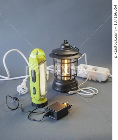 Portable solutions for power and lighting in emergency situations: lanterns, flashlights, power banks and external batteries 137166054