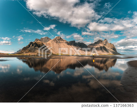 Scenic Vestrahorn mountain reflection at Stokknes beach, Iceland 137166363