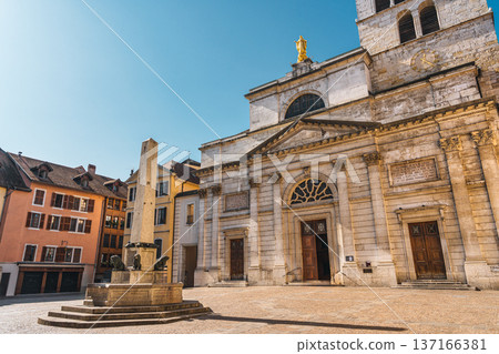 Architectural medieval historic of Notre Dame with Obelisk fountain and old town building in Annecy, France Architectural medieval historic of Notre Dame with Obelisk fountain and old town building in Annecy, France 137166381