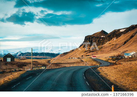 Reynisfjara Lutheran church on the road nearby Reynisfjara beach in autumn at Iceland 137166396